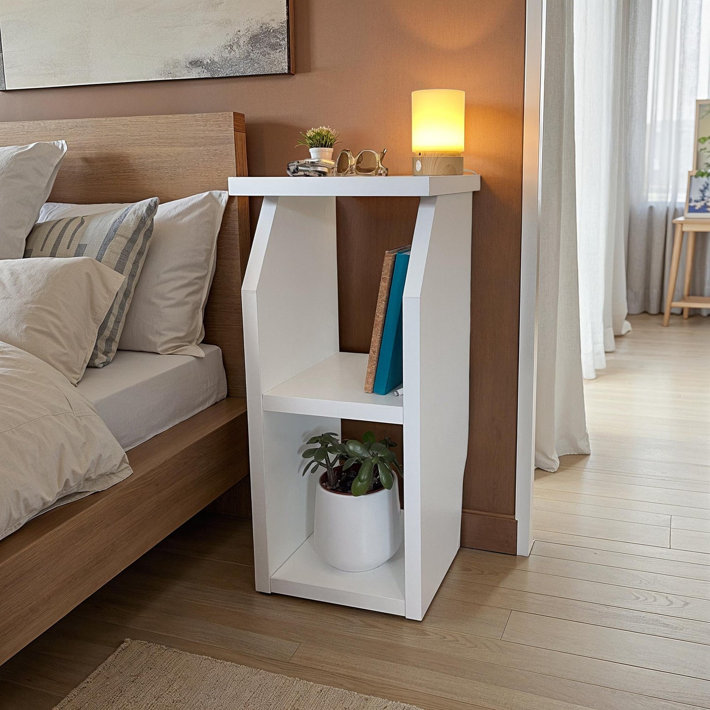 White particle board side table with open shelves, ideal for living rooms, bedrooms and compact modern spaces.