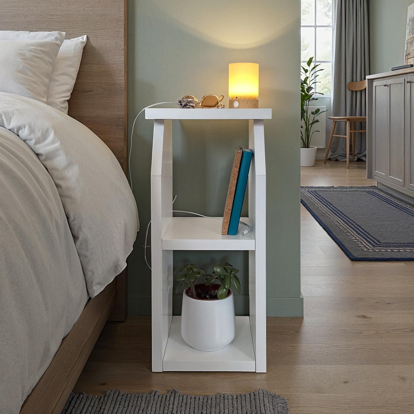Modern white side table with two open shelves, compact design, and sturdy construction for bedroom or living room use