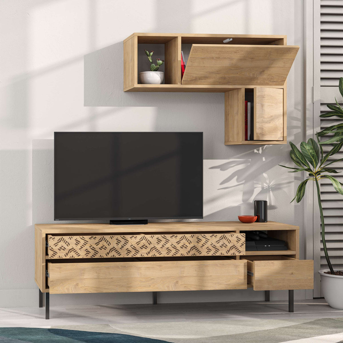 Modern TV unit with wall-mounted storage and patterned drawers, ideal for living room media and cable organisation.