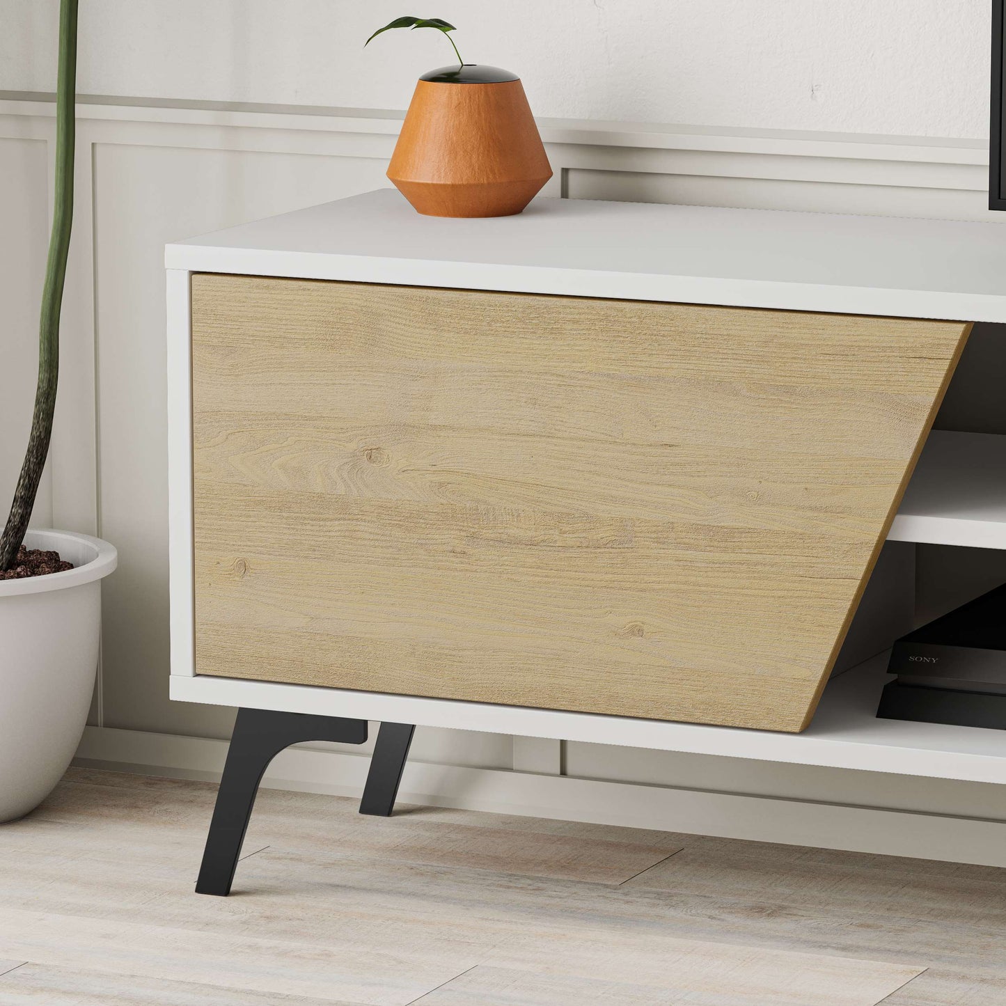 Contemporary TV unit with angled cabinet doors, media shelf and wall-mounted storage, ideal for organised entertainment spaces.