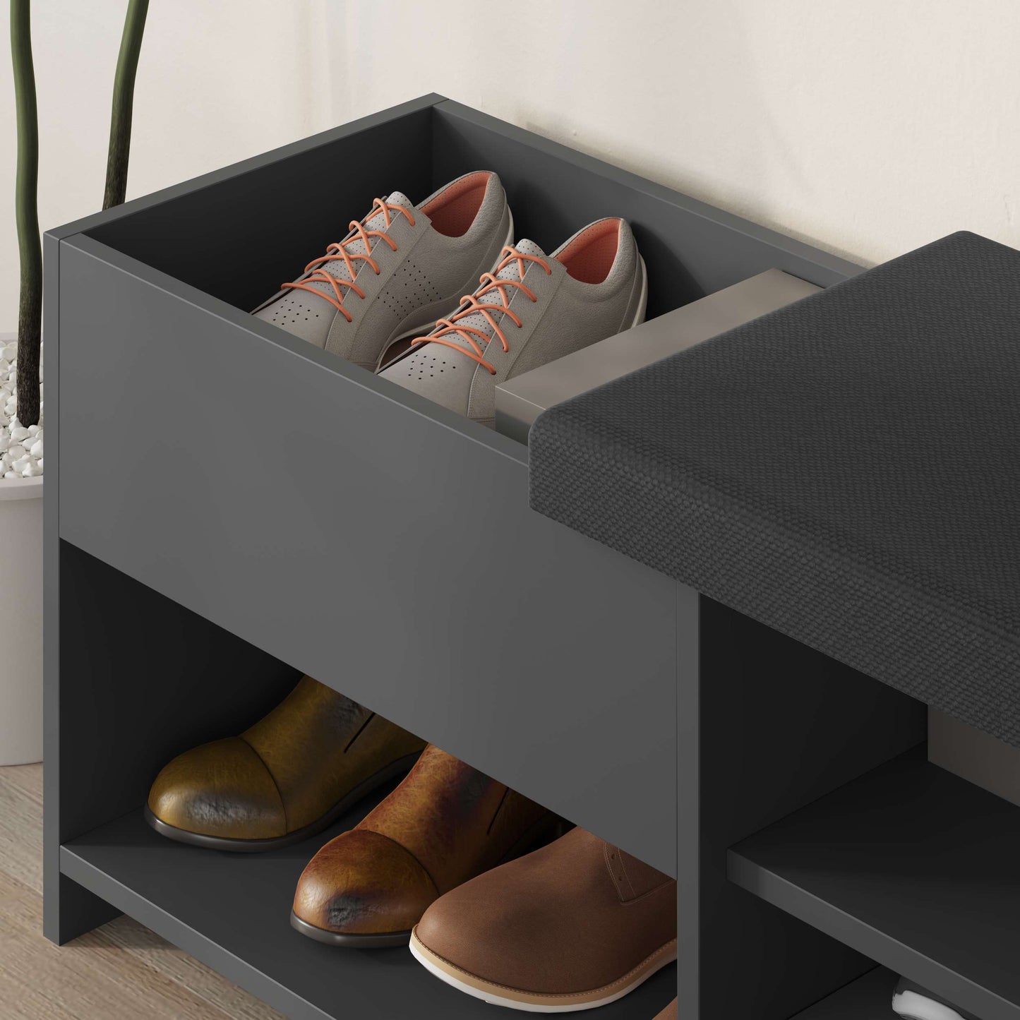 Compact hallway shoe bench with cushioned seat, open shelves and flap compartment, perfect for entryway storage.