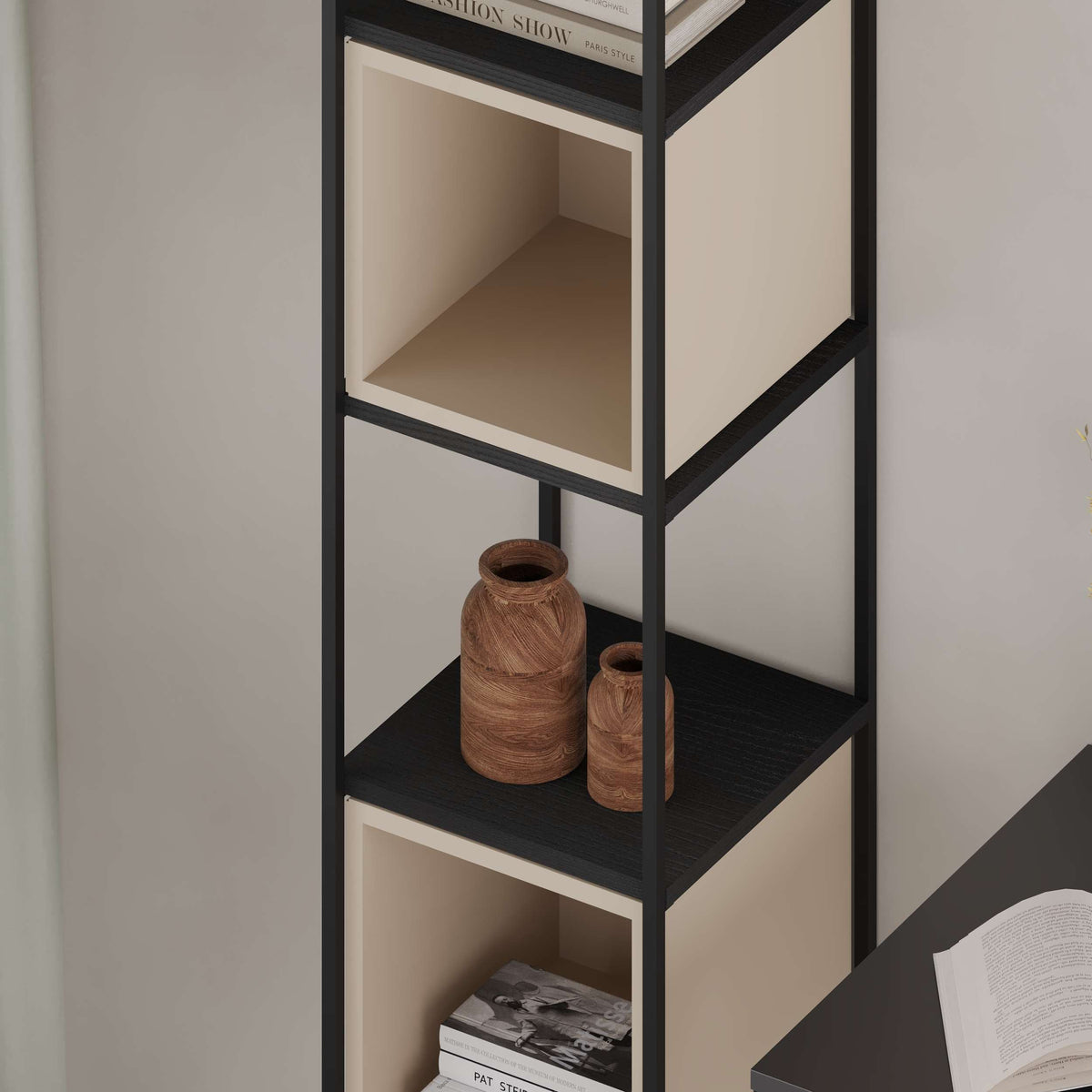 Tall narrow bookcase with black metal frame and wood cube shelves, ideal for small spaces and vertical storage.