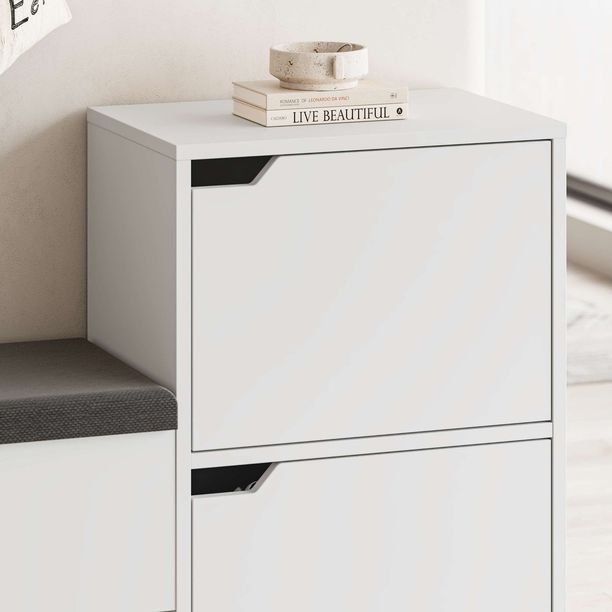 Entryway shoe bench with padded seat, open shelf and flap doors, ideal for hallway storage and seating.