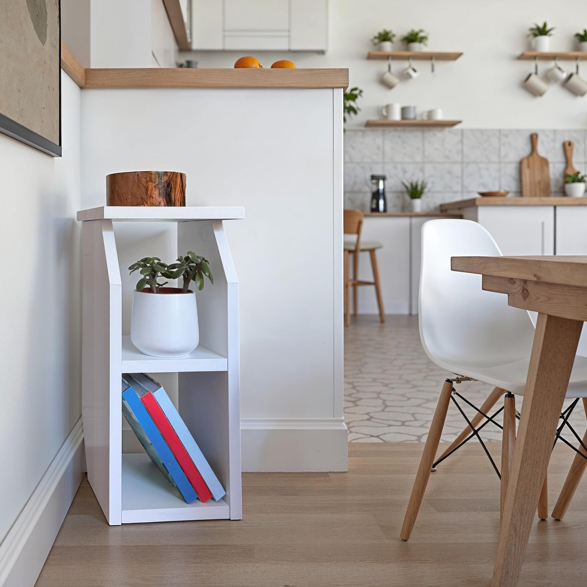 White particle board side table with open shelves, ideal for living rooms and compact modern spaces.