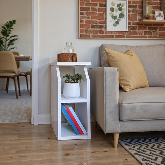 Modern white side table with two open shelves, compact design, and sturdy construction for bedroom or living room use