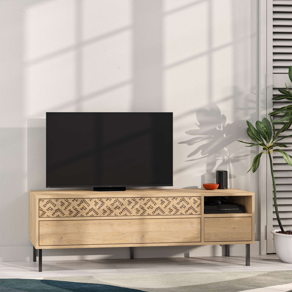 TV unit with drawers, open shelf and decorative front panel for living room media storage