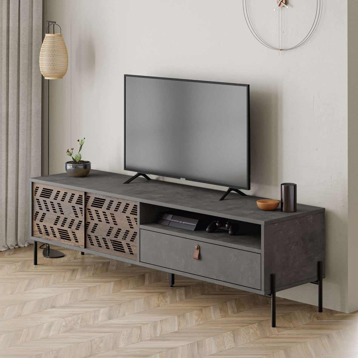 TV unit with laser-cut doors, open shelf and drawer, ideal for stylish media storage in modern living rooms.