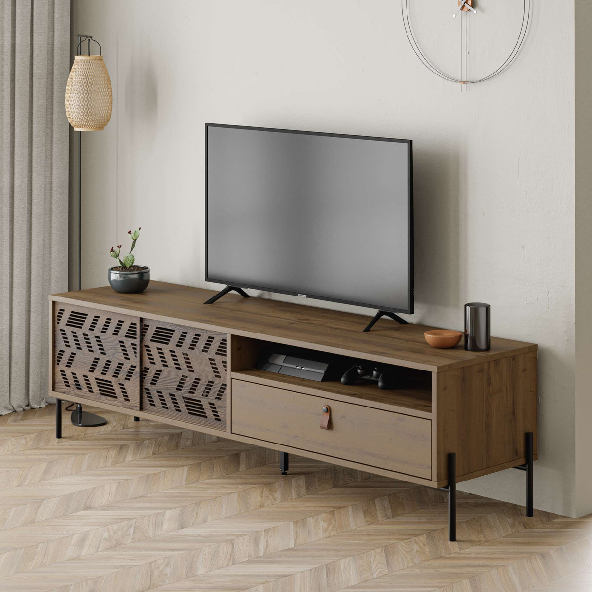 TV unit with laser-cut doors, open shelf and drawer, ideal for stylish media storage in modern living rooms.