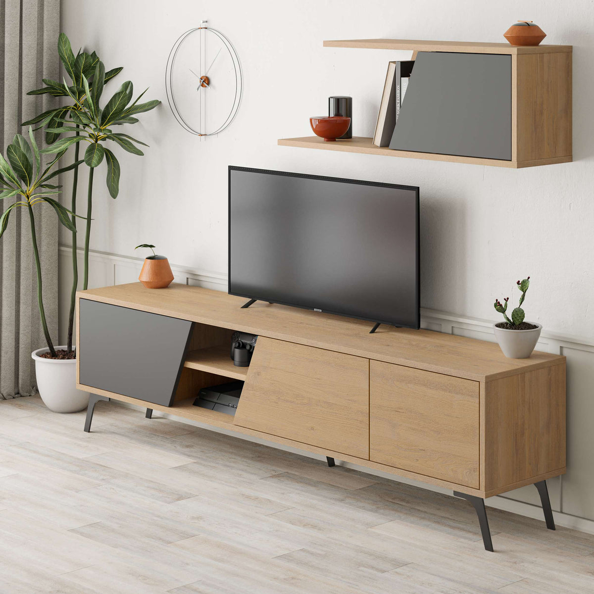 Contemporary TV unit with angled cabinet doors, media shelf and wall-mounted storage, ideal for organised entertainment spaces.