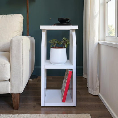 White particle board side table with open shelves, ideal for living rooms and compact modern spaces.