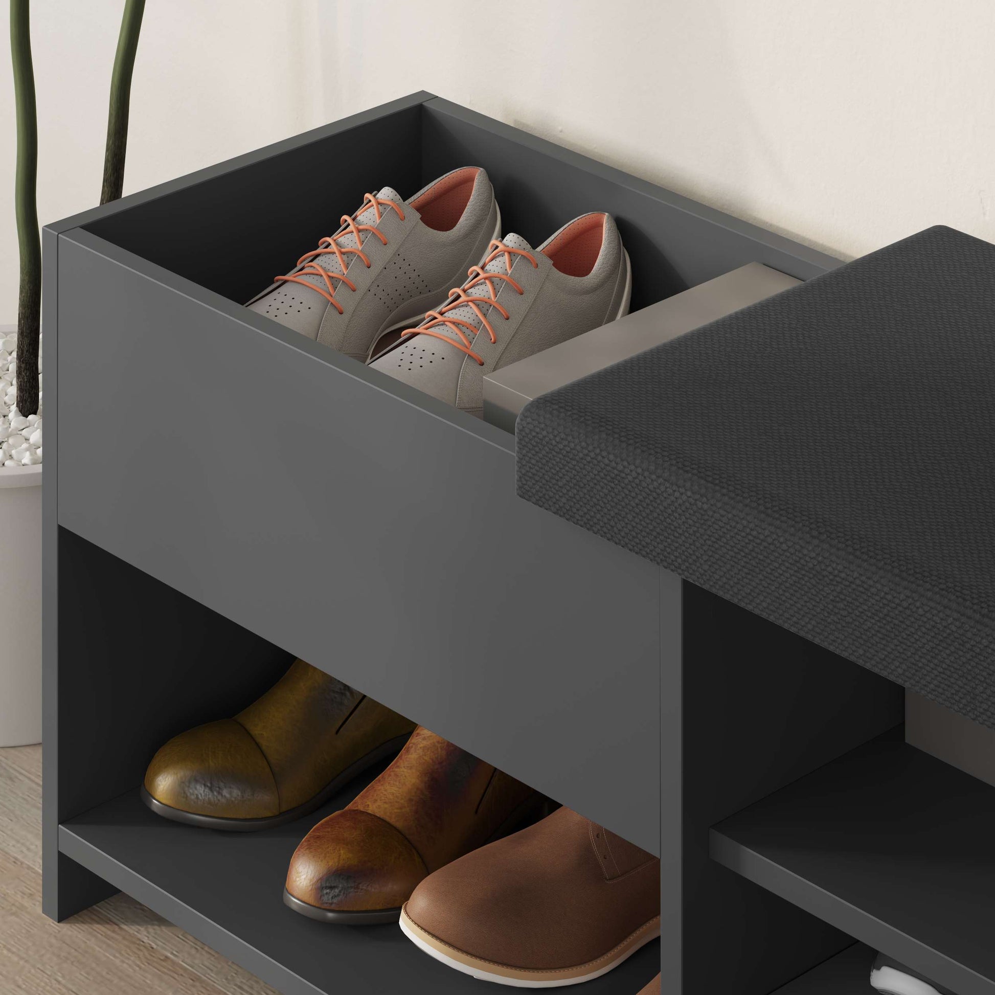 Compact hallway shoe bench with cushioned seat, open shelves and flap compartment, perfect for entryway storage.