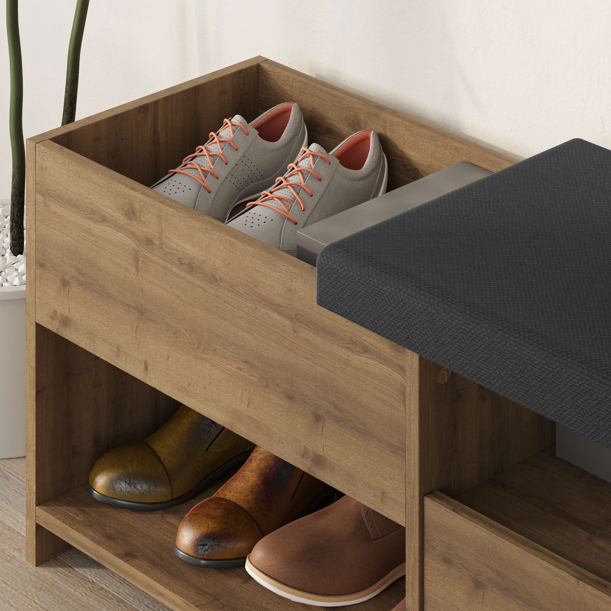 Compact hallway shoe bench with cushioned seat, open shelves and flap compartment, perfect for entryway storage.